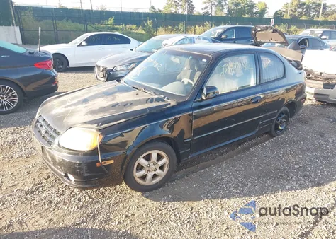 2004 Hyundai Accent Gl/Gt z USA, uszkodzony, nr VIN KMHCG35C44U305301